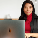 Woman on an apple laptop